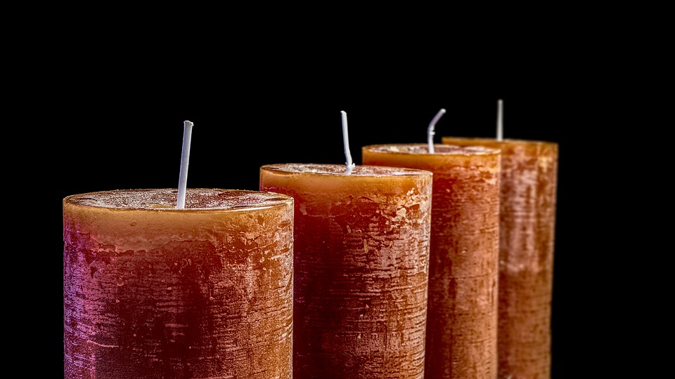 Rust colored locally made candles for sale at Urban Oasis Day Spa