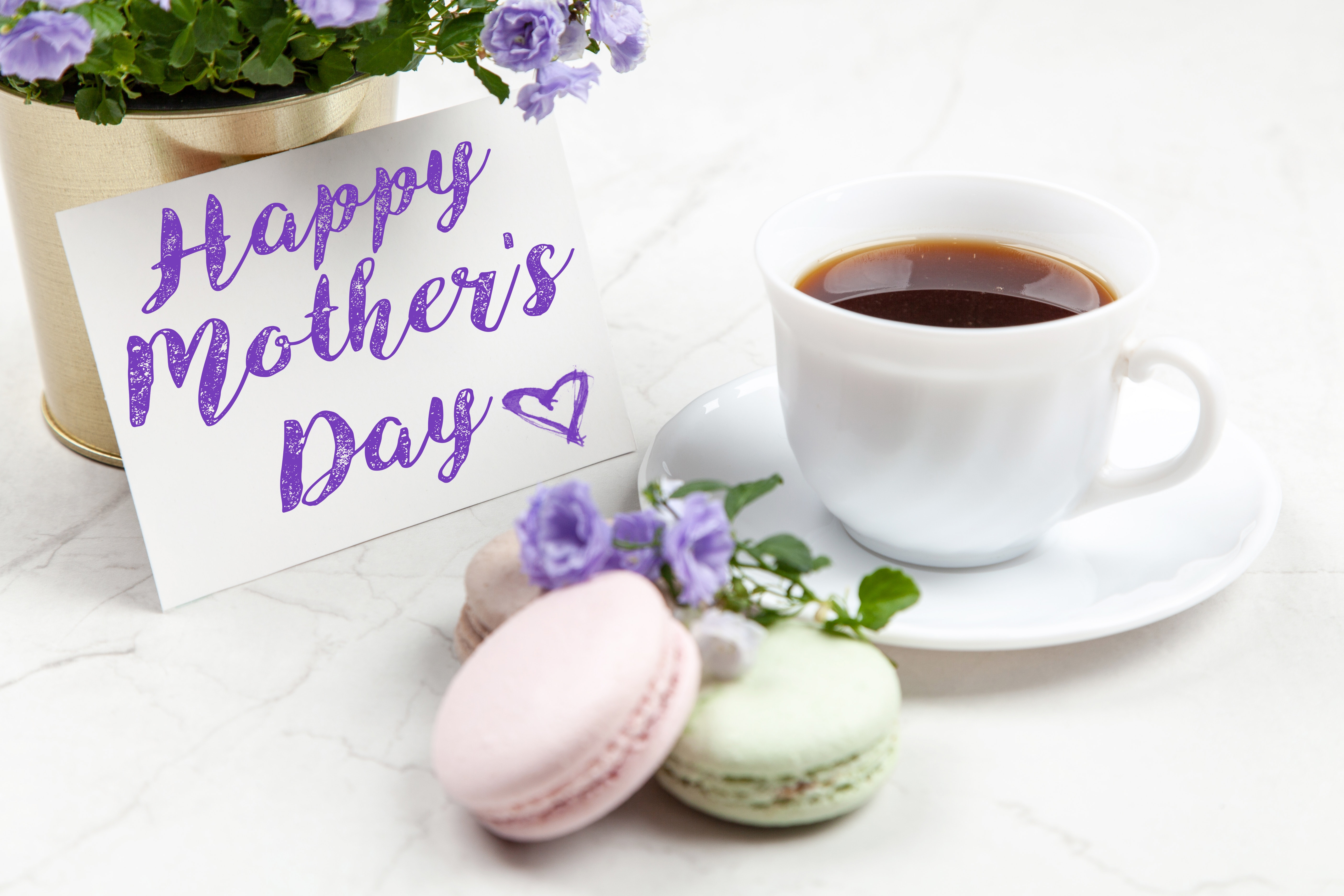 Happy Mother's Day greeting card with tea and macaroons