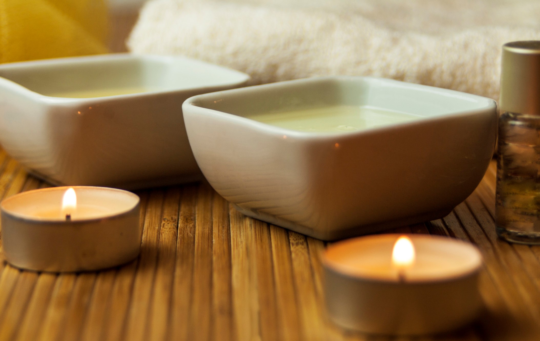 Two tea candles creating a relaxing spa day