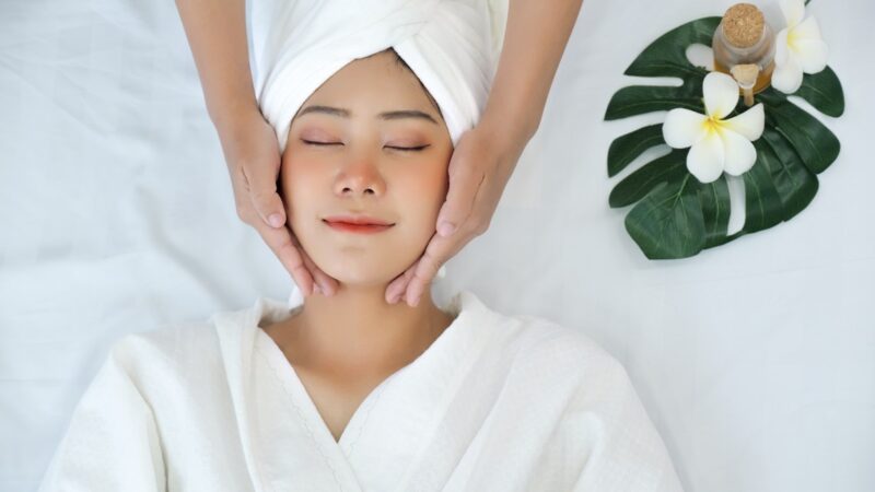 Woman getting a relaxing facial at urban oasis day spa