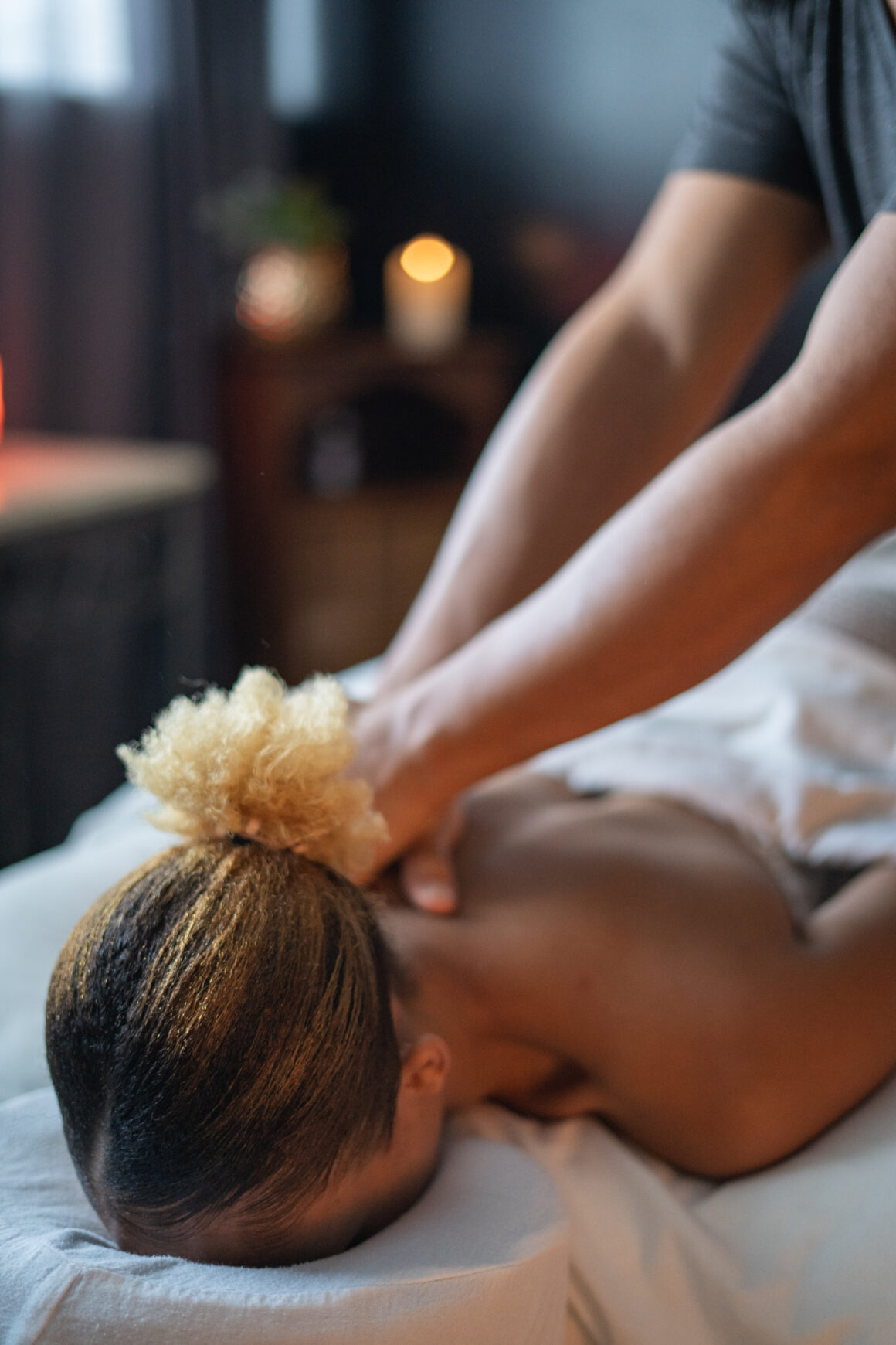 woman receiving a massage at Urban Oasis Nashville Day Spa