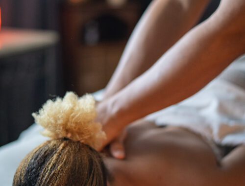 woman receiving a massage at Urban Oasis Nashville Day Spa