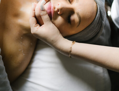 Woman receiving an acne clearing facial with Circadia products at Urban Oasis Nashville spa