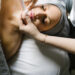 Woman receiving an acne clearing facial with Circadia products at Urban Oasis Nashville spa