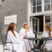 Three women enjoying a spa day with champagne before their treatments at a Nashville day spa