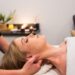 Woman receiving a relaxing massage at Urban Oasis Nashville as part of a fall spa membership