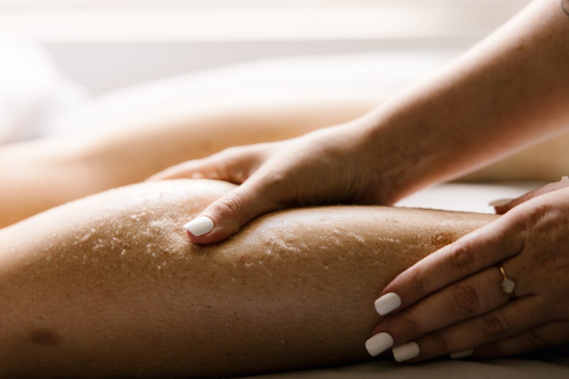 Woman receiving a therapeutic Oasis massage and body treatment at Urban Oasis Nashville, designed to support muscle relief, relaxation, and overall wellness