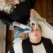 Licensed permanent makeup artist performing a customized nano brow procedure during a professional permanent makeup appointment at Urban Oasis Nashville.