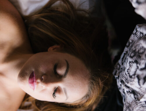 Woman relaxing during a stress relief massage at Urban Oasis Nashville in Midtown Nashville.