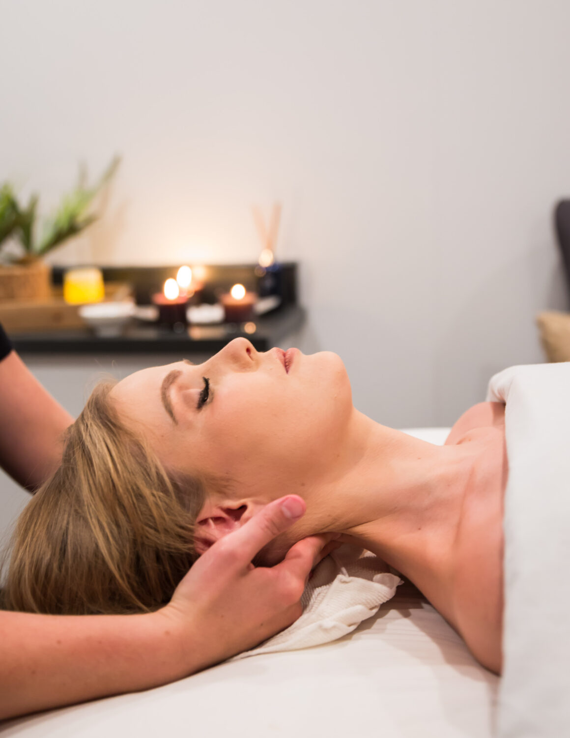 Woman enjoying a relaxing massage at Urban Oasis Nashville day spa